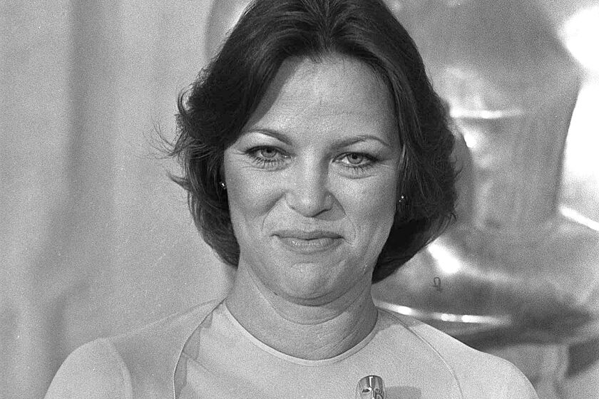 In this March 29, 1976 file photo, Louise Fletcher holds the Oscar she won for "One Flew Over the Cuckoo's Nest."