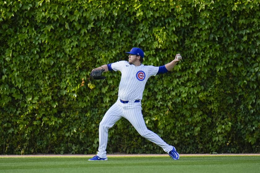 Chicago Cubs starting pitcher Justin Steele warms up before a baseball game against the San Diego Padres, Monday, May 6, 2024, in Chicago. (AP Photo/Erin Hooley)