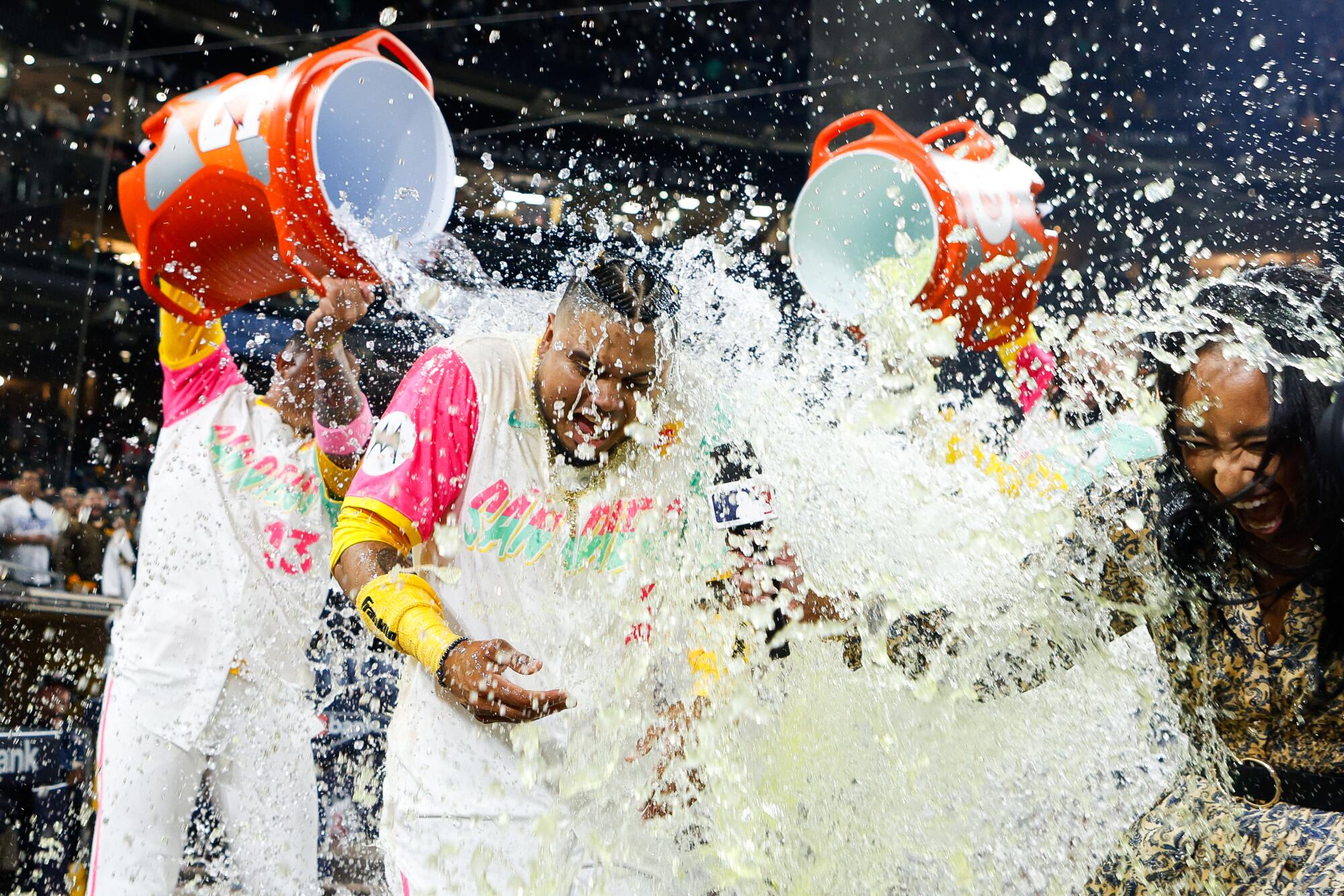 Luis Arraez (4) is doused with Gatorade after a walk-off single against the Dodgers.