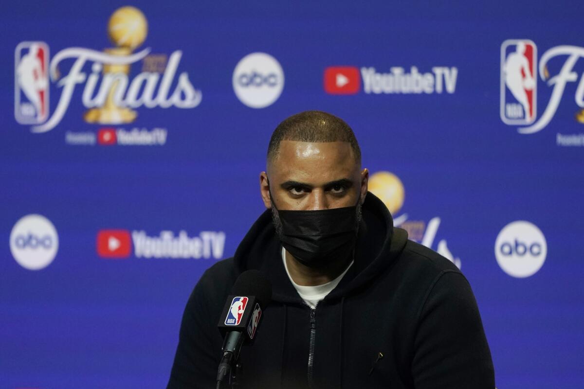 Boston Celtics head coach Ime Udoka speaks to reporters before his team's Game 1 of basketball's NBA Finals against the Golden State Warriors in San Francisco, Thursday, June 2, 2022. (AP Photo/Jeff Chiu)