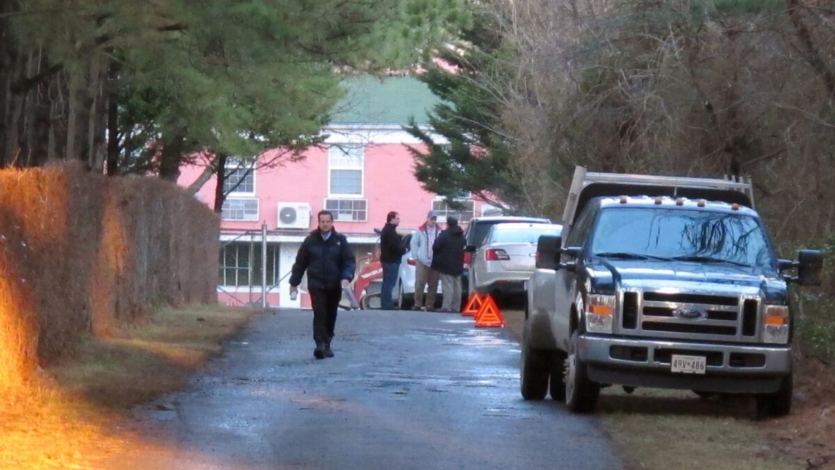 State Department officials block the entrance to a Russian compound Dec. 29 near Centreville, Md.