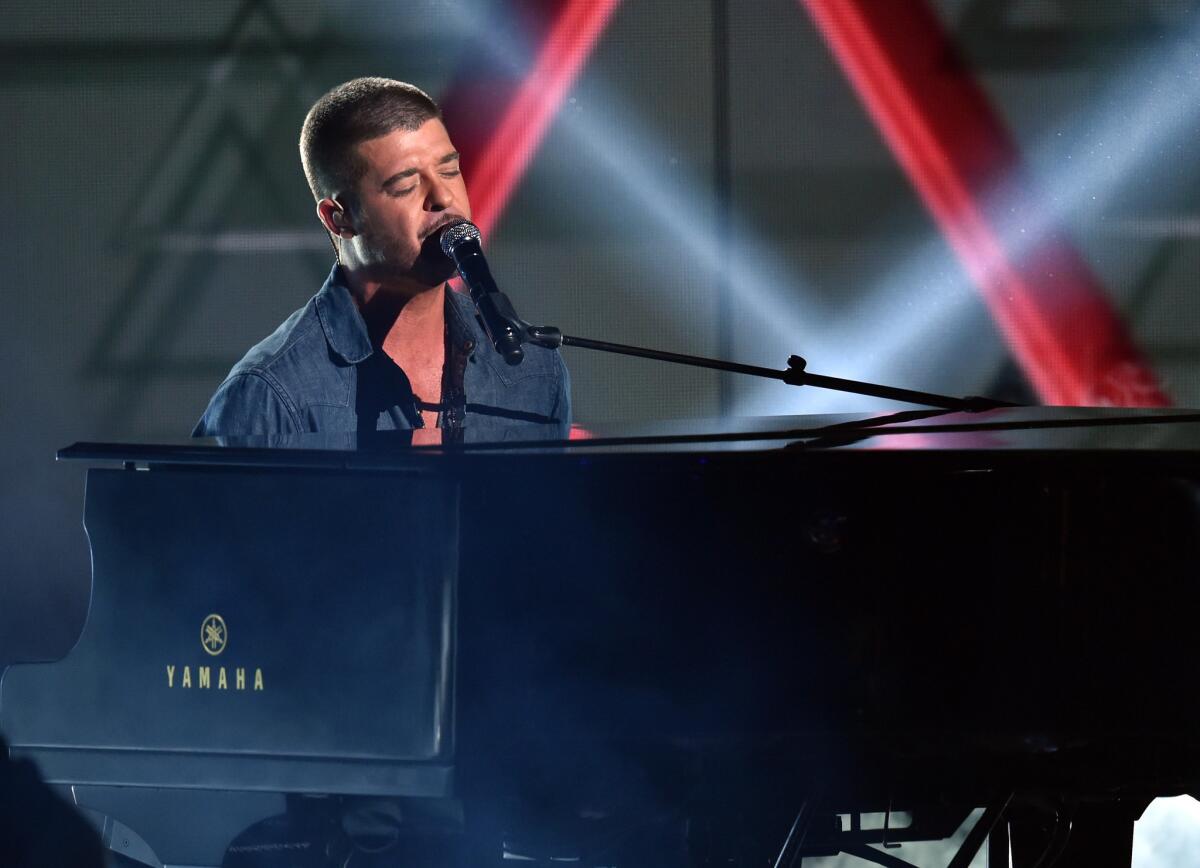 Robin Thicke performs at the BET Awards on Sunday at L.A. Live in downtown Los Angeles.