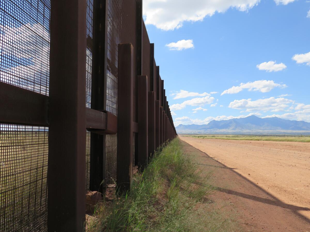 A part of the border fence near Naco, Ariz. An architectural competition for a new wall design has ignited a controversy.