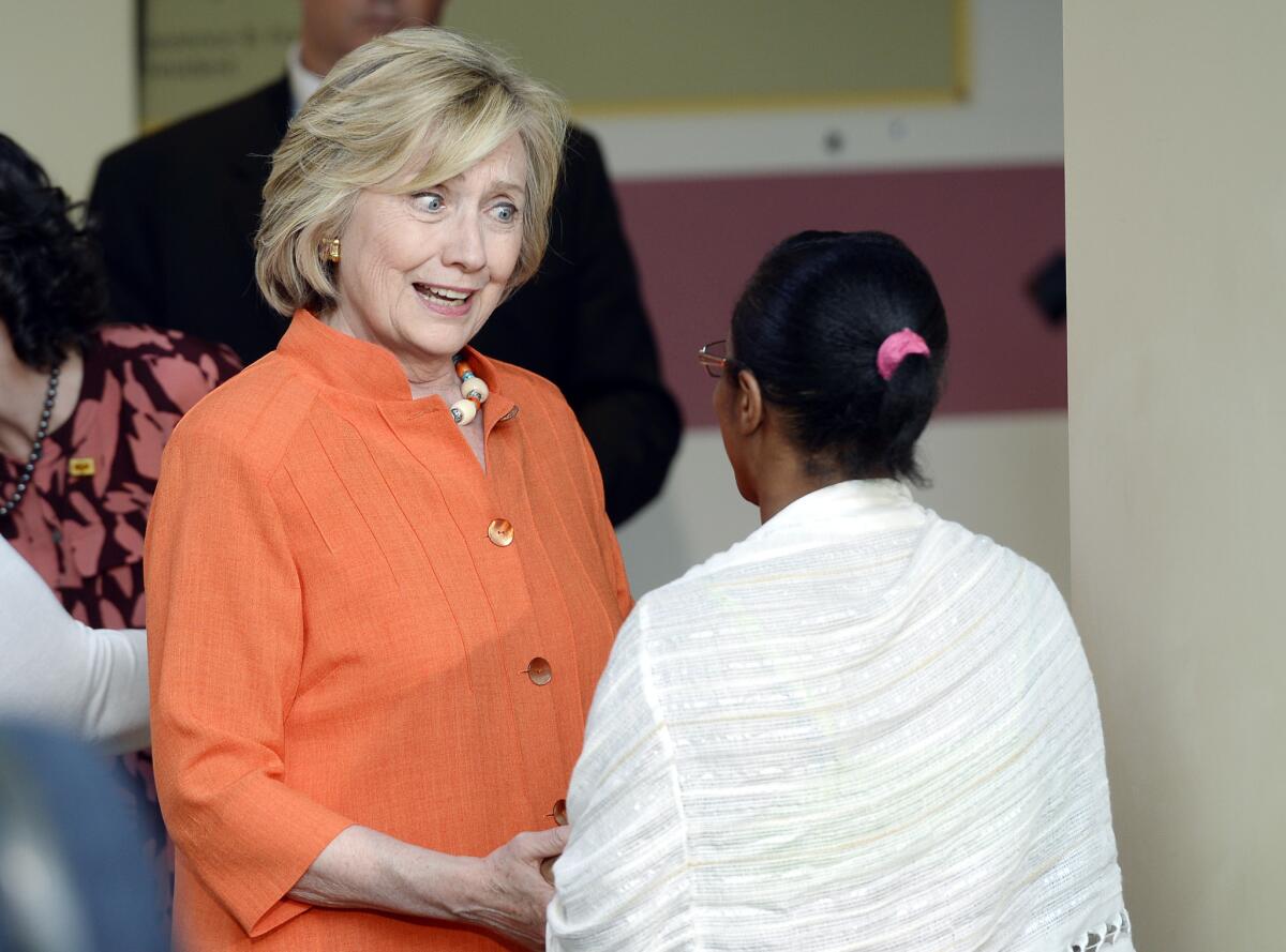 Democratic presidential hopeful Hillary Rodham Clinton greets Aretha Peters, a home care provider from Cleveland, at an event at Los Angeles Trade Technical College on Aug. 5. Clinton later attended a fundraiser.