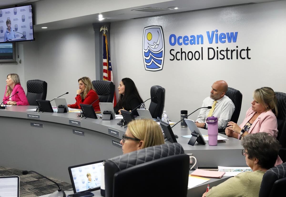 The Ocean View School District Board of Trustees listens to supporters of Measures A and B during Tuesday night's meeting.