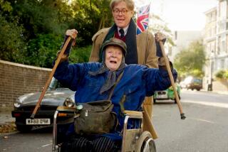 Maggie Smith and Alex Jennings in a scene from Alan Bennett's "The Lady In The Van" in 2014 in London.