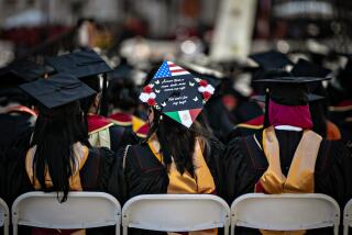 LOS ANGELES, CA - MAY 13: A graduate with a decorated cap attends The University of Southern California's 2022 commencement ceremony on Friday, May 13, 2022 in Los Angeles, CA. (Jason Armond / Los Angeles Times)