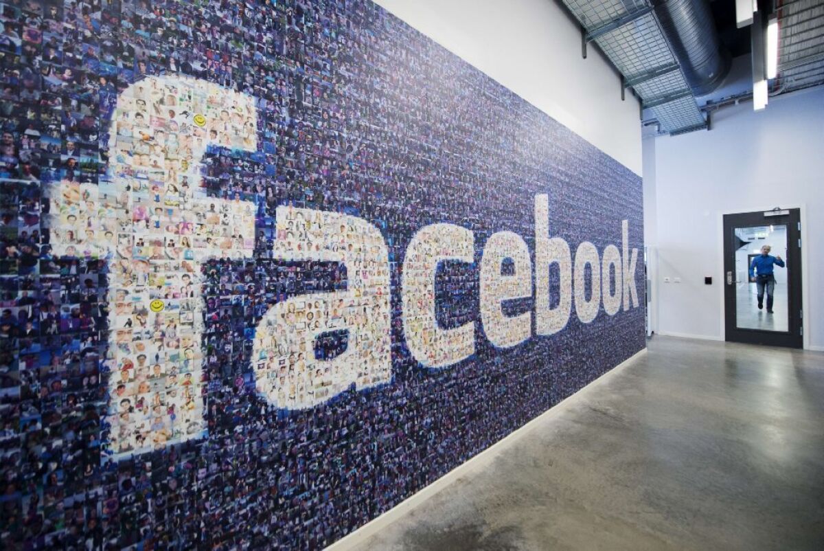The Facebook logo adorns a wall at the company's data center in Sweden.