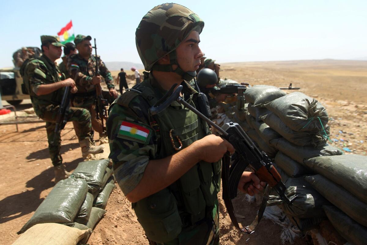 Iraqi Kurdish peshmerga fighters in Bashiqa, northeast of Mosul, on Saturday.