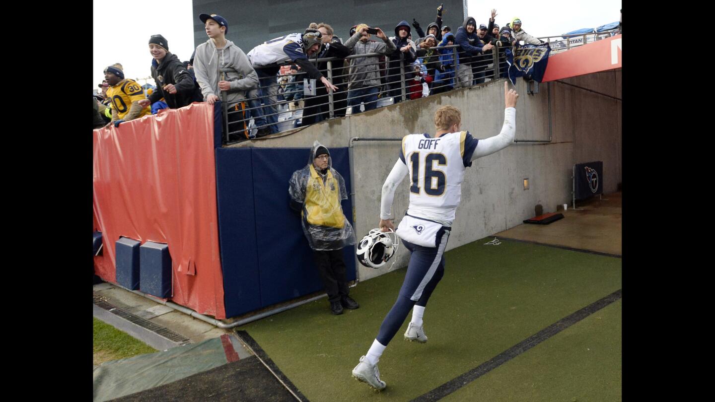 Quarterback Jared Goff waves to fans as he leaves the field following the Rams victory over the Titans.