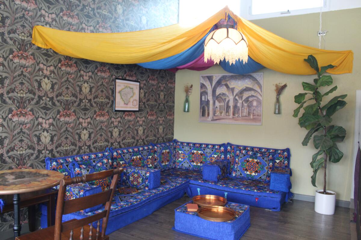 A tented seating option inside Del Mar's new Bohemian Alchemist.
