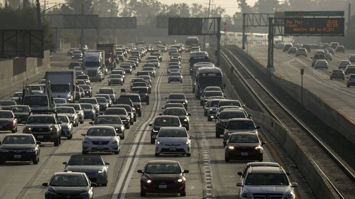 Morning commuters face heavy traffic on the express lanes on the 10 Freeway. The Metropolitan Transportation Authority's focus on congestion pricing could lead to similar lanes on other freeways across Los Angeles County.