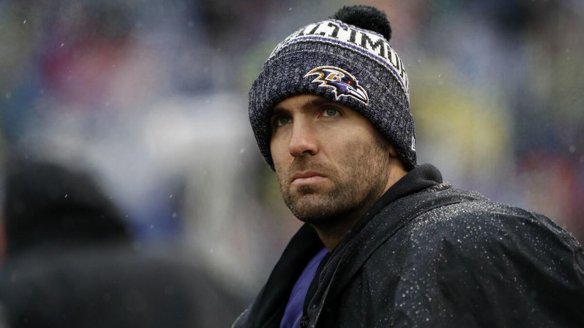 Ravens quarterback Joe Flacco looks on from the sidelines during a game against the Tampa Bay Buccaneers on Dec. 16.