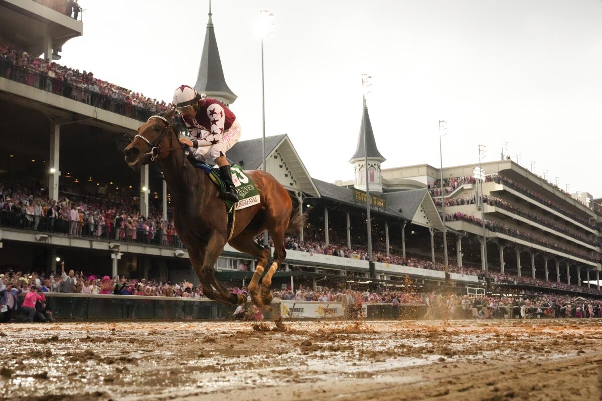 Brian Hernandez Jr. rides Thorpedo Anna to victory in the 150th running of the Kentucky Oaks at Churchill Downs on Friday.