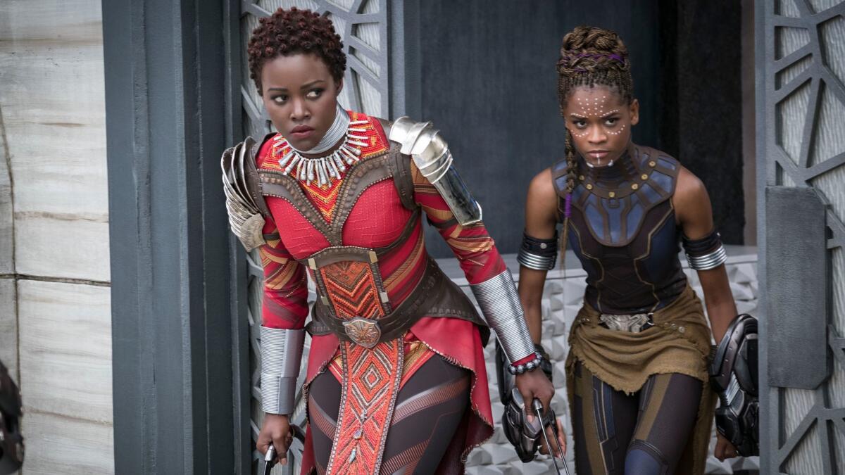 Don't look now. Lupita Nyong'o (left) and Letitia Wright are stealing away with Marvel Studios' "Black Panther."