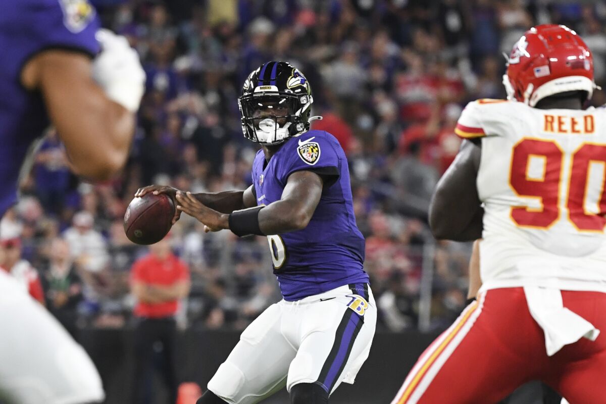 Baltimore Ravens quarterback Lamar Jackson looks to pass against the Kansas City Chiefs.