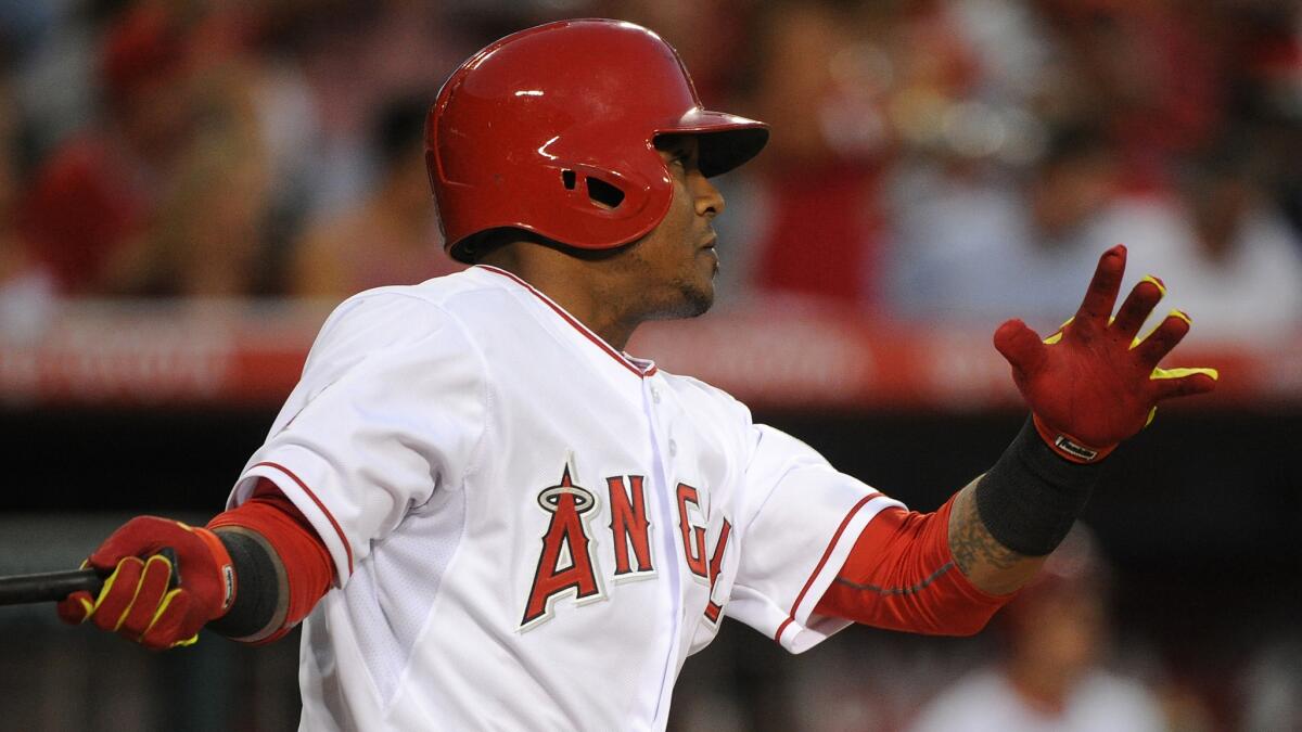 Angels shortstop Erick Aybar singles during the second inning of the team's 6-4 win over the Cleveland Indians at Angel Stadium on Tuesday night.