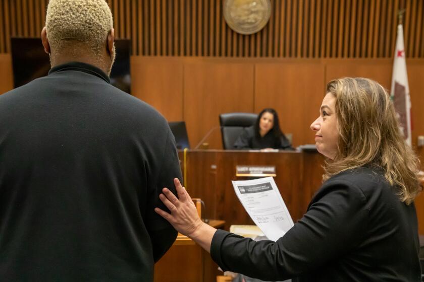 LOS ANGELES, CA - MAY 24: The defendant appears before Judge Maria Lucy Armendariz with his public defender, Caroline Goodson in Dept. 48, Clara Shortridge Foltz Criminal Justice Center, Los Angeles, CA. (Irfan Khan / Los Angeles Times)