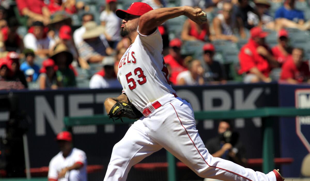 Angels starting pitcher Hector Santiago gave up five hits and issued five walks as well as three runs in two innings against the Astros on Sunday.
