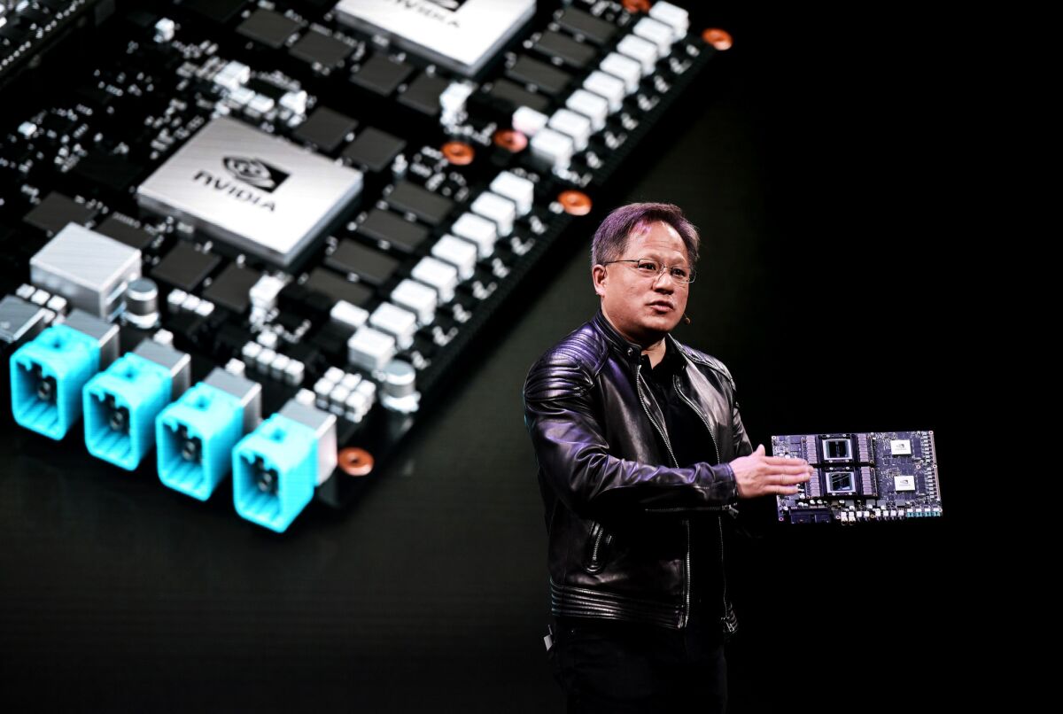 Nvidia CEO Jensen Huang speaks during a news conference at CES 2018 in Las Vegas.