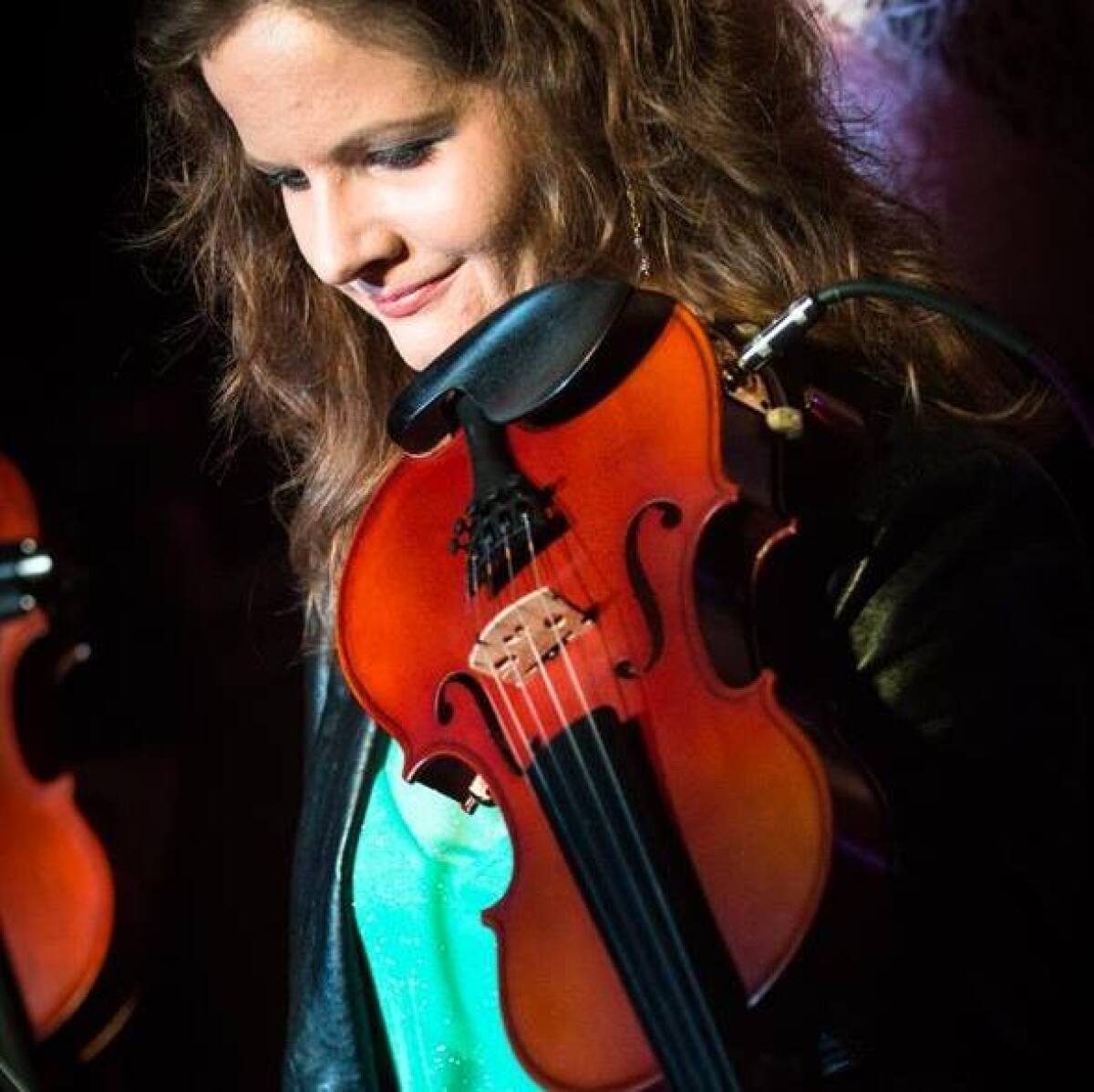 Musician Corinne Olsen with her viola. 