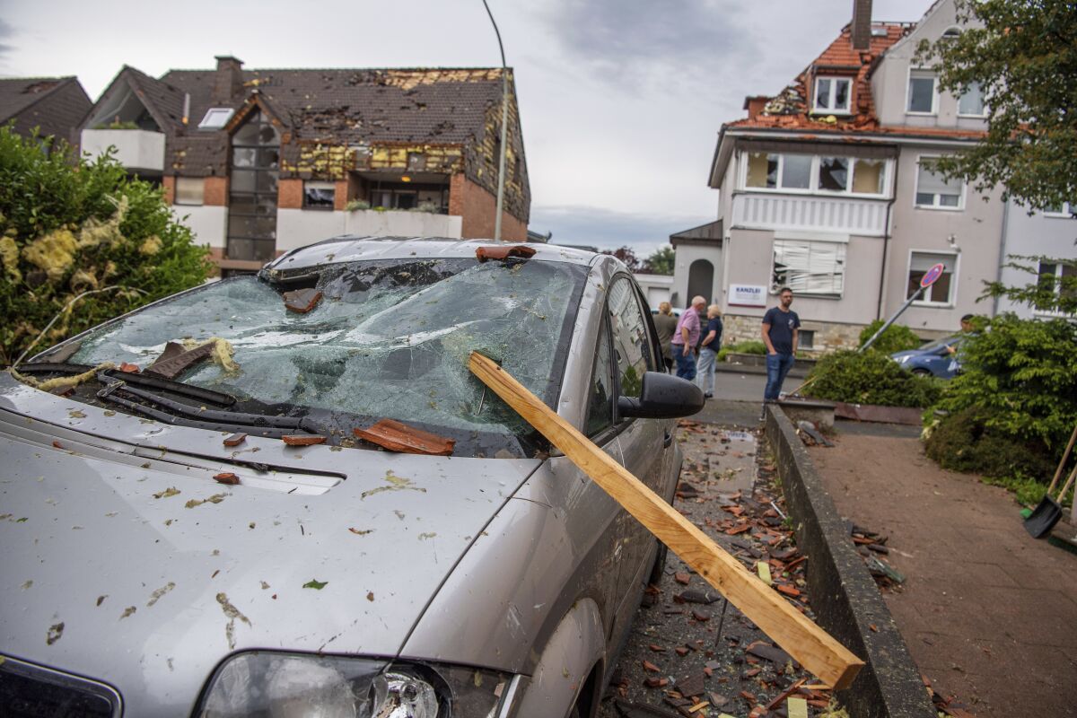 A damaged car is seen after a storm in Paderborn, Germany