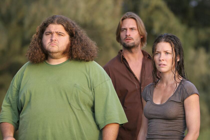 In this undated publicity photo released by ABC, actors Jorge Garcia, left, Josh Holloway, center, and Evangeline Lilly appear in this scene from the television series "Lost." Lost had multiple nominations on Thursday, July 6, 2006, when the nominations for the 58th Annual Primetime Emmy Awards were announced in Los Angeles. (AP Photo/ABC, Mario Perez) ORG XMIT: LA102