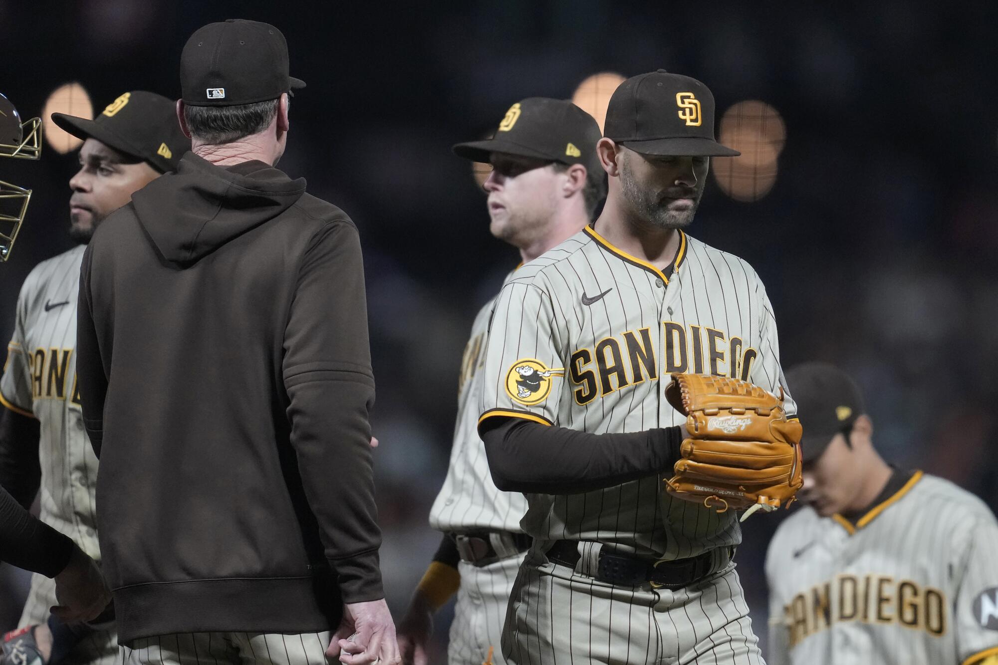 San Diego Padres starting pitcher Nick Martinez congratulates