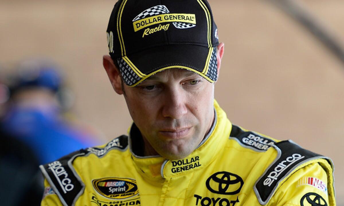 Matt Kenseth looks on during practice Friday for Sunday's NASCAR Sprint Cup Series race at Auto Club Speedway in Fontana.