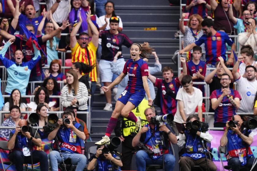 Barcelona's Aitana Bonmati celebrates scoring her side's first goal during the women's Champions League final soccer match between FC Barcelona and Olympique Lyonnais at the San Mames stadium in Bilbao, Spain, Saturday, May 25, 2024. (AP Photo/Jose Breton)
