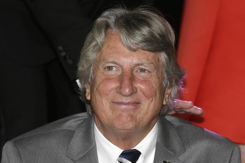 FILE - Former U.S. high jumper Dick Fosbury poses during the 2014 World Athletics Gala Awards, Friday, Nov. 21, 2014, in Monaco. Fosbury, the lanky leaper who completely revamped the technical discipline of high jump and won an Olympic gold medal with his “Fosbury Flop,” has died after a recurrence with lymphoma. Fosbury died Sunday, March 12, 2023, according to his publicist, Ray Schulte. He was 76. (AP Photo/Lionel Cironneau, File)