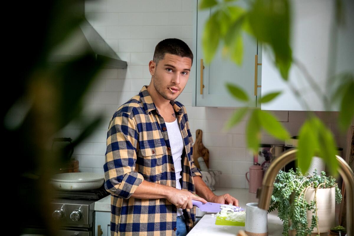 Actor Ronen Rubinstein finds that chopping onions with a matchstick in his mouth keeps his eyes from tearing. He's on a vegan kick.