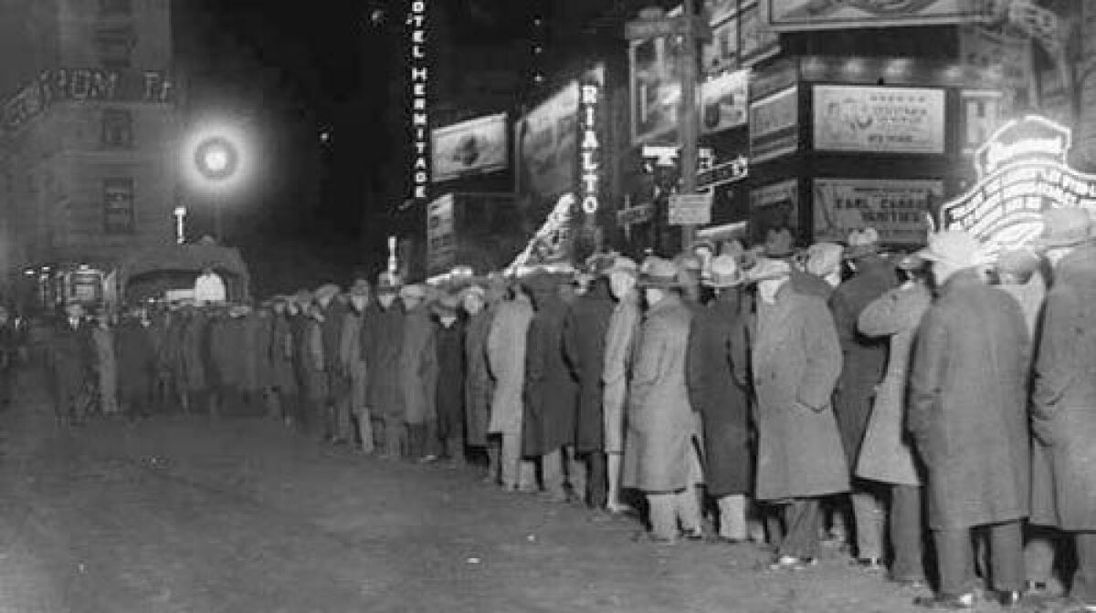 A bread line in New York's Times Square in December 1930. The U.S. government made many early missteps in its response to the Great Depression.