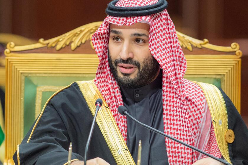 In this photo released by Saudi Royal Palace, Saudi Crown Prince Mohammed bin Salman, speaks during the Gulf Cooperation Council (GCC) Summit in Riyadh, Saudi Arabia, Tuesday, Dec. 14, 2021. Strategic U.S. interests in oil and security are pushing President Joe Biden toward meeting with Saudi Crown Prince Mohammed bin Salman during an overseas trip later this month. (Bandar Aljaloud/Saudi Royal Palace via AP, File)