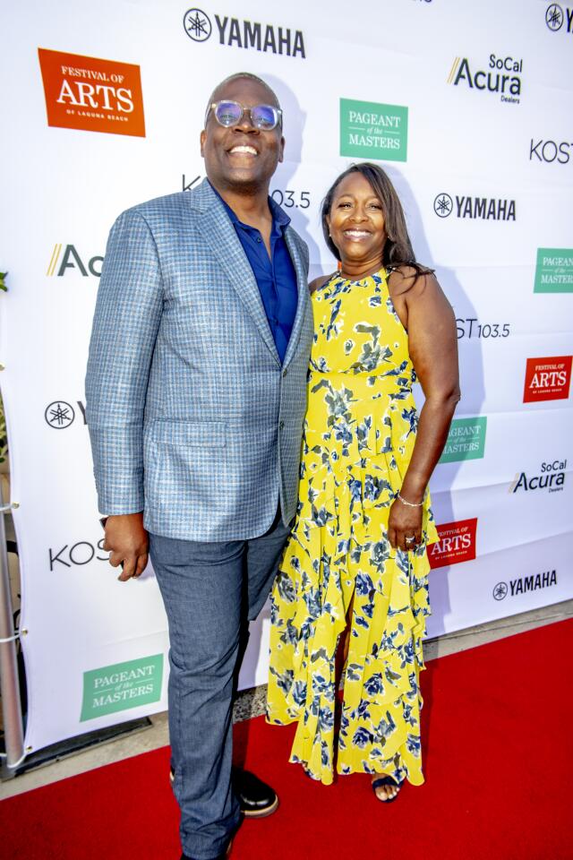 Jonathan ("Last Man Standing") and Monica Adams pose for photos on the red carpet of the Celebrity Benefit at Festival of Arts and Pageant of the Masters on Saturday in Laguna Beach.