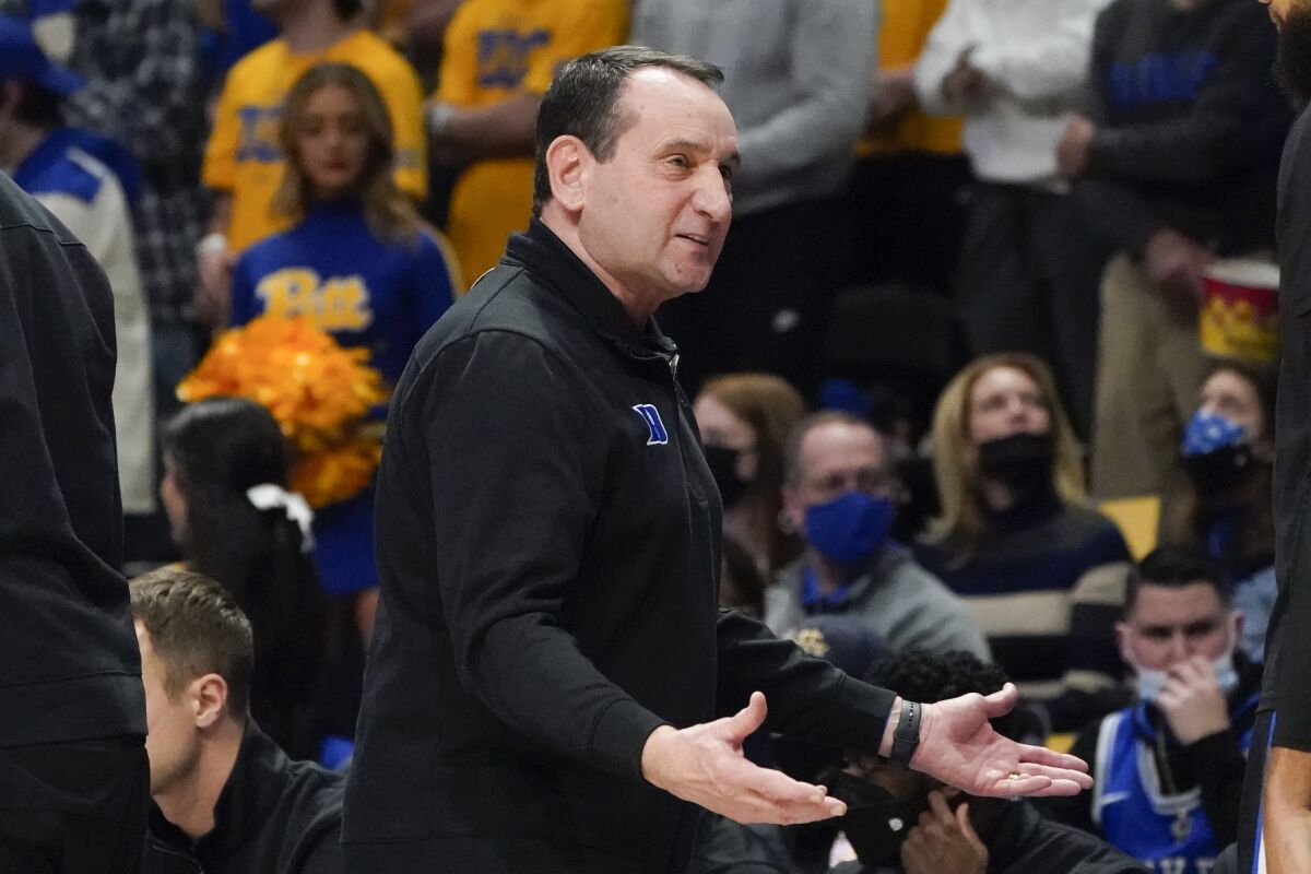 Duke coach Mike Krzyzewski gestures during the first half of the team's NCAA college basketball game against Pittsburgh, Tuesday, March 1, 2022, in Pittsburgh. Duke won 86-56. (AP Photo/Keith Srakocic)