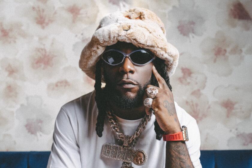 NEW YORK, NY - JULY 9: Burna Boy photographed in Sei Less in New York, NY on July 9, 2023. (Oye Diran / For The Times)