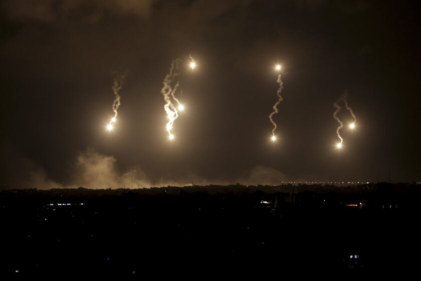 Israeli forces' flares light up the night sky in the northern Gaza Strip.