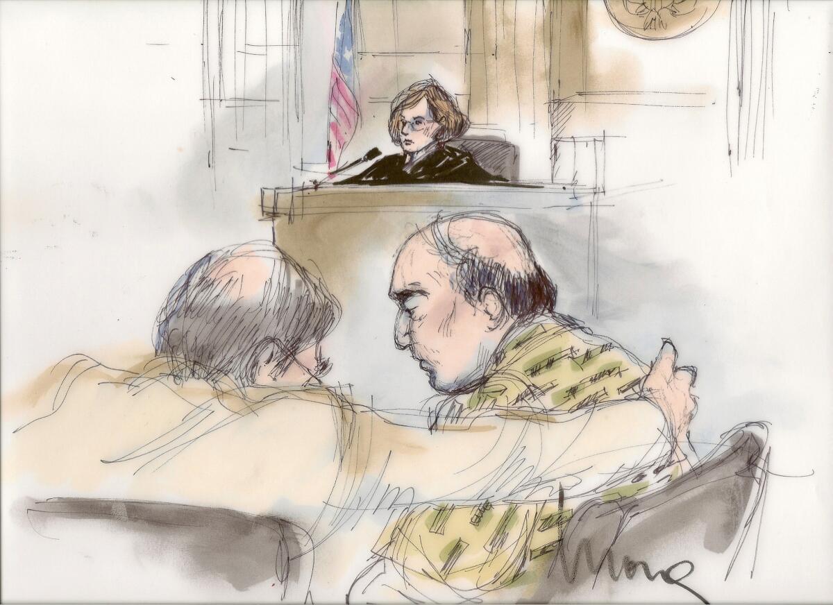 A courtroom sketch shows Mark Basseley Youssef talking with his attorney Steven Seiden, left, as U.S. Central District Chief Magistrate Judge Suzanne Segal presides over the proceeding.