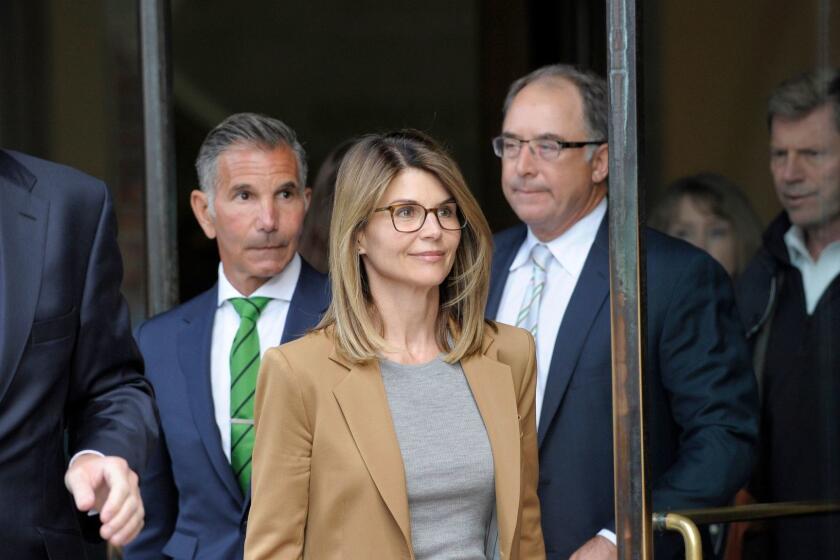 Actress Lori Loughlin exits the courthouse after facing charges for allegedly conspiring to commit mail fraud and other charges in the college admissions scandal at the John Joseph Moakley United States Courthouse in Boston on April 3, 2019. (Photo by Joseph Prezioso / AFP)JOSEPH PREZIOSO/AFP/Getty Images ** OUTS - ELSENT, FPG, CM - OUTS * NM, PH, VA if sourced by CT, LA or MoD **