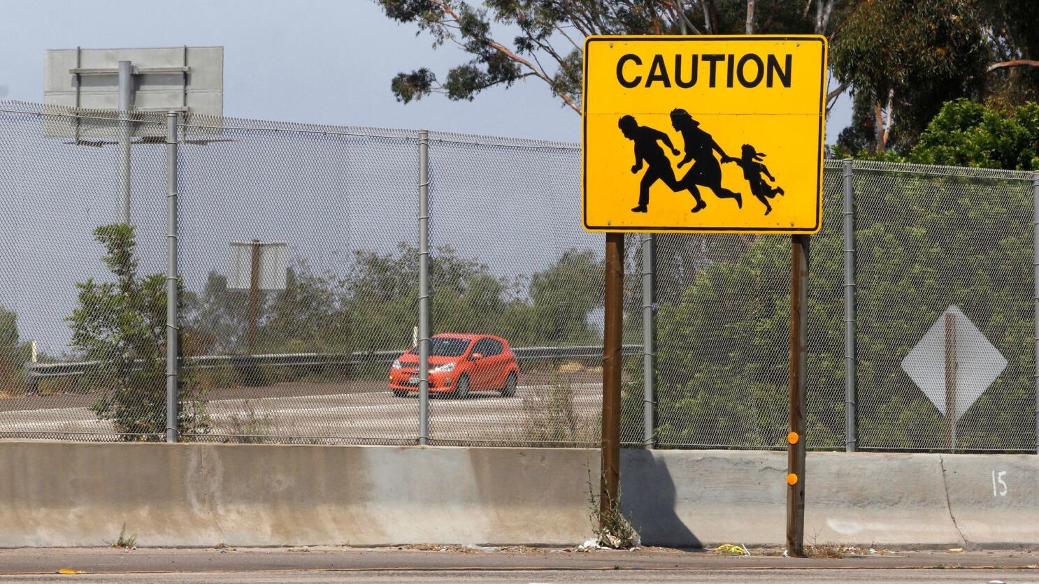 Immigrant Crossing Sign Family Running Across Road Unique 