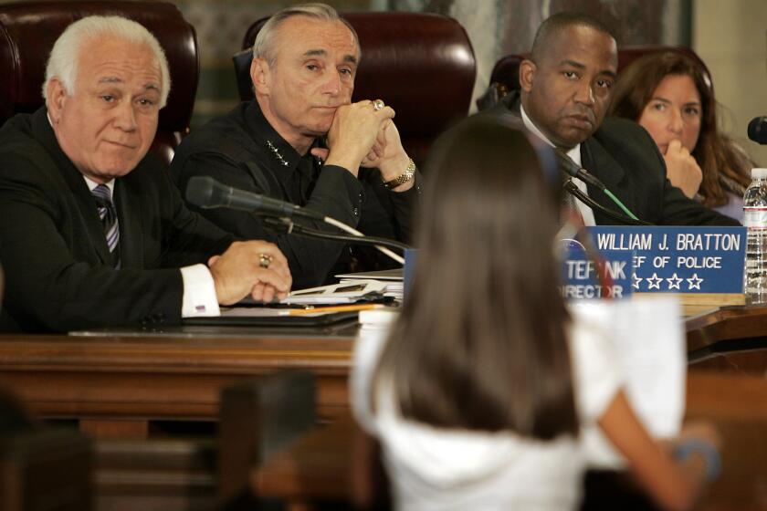 LOS ANGELES, CA. Members of the Police Commission (LR) Richard Tefank, Chief William J. Bratton, Andre Birotte Jr., and Shelley Freeman listen to Karla Vargas a 10yearold 5th grader explain what she witnessed when she was at the May Day MacArthur Park rally with her Mother, younger brother and Grandmother. Karla is one of the plaintiffs in a case filed against the LAPD. The Police Commission meeting agenda included the LAPD's report on the department's response to the May Day rally in MacArthur Park. (Photo by Al Seib/Los Angeles Times via Getty Images)