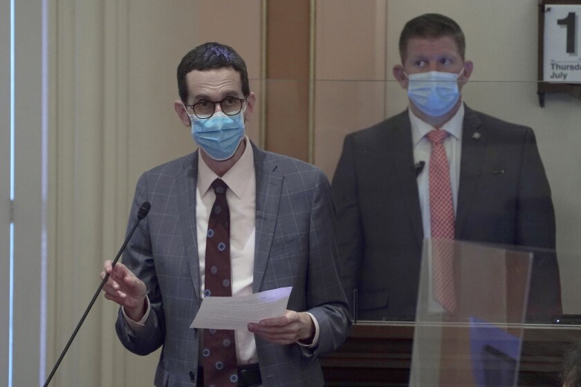State Sen. Scott Wiener, D-San Francisco, wears a face mask as he speaks on the floor of the Senate in Sacramento, Calif., Thursday, July 15, 2021. Gay rights advocates said Monday, July 19, 2021 that they will seek to challenge an appeals court decision tossing out part of a California law designed to protect older LGBTQ residents in nursing homes. (AP Photo/Rich Pedroncelli)