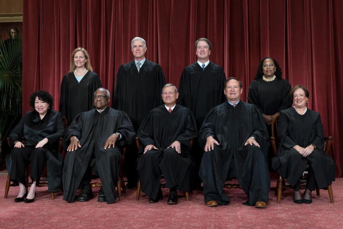 The justices of the Supreme Court sit for a group portrait at the start of the 2022-23 term. 