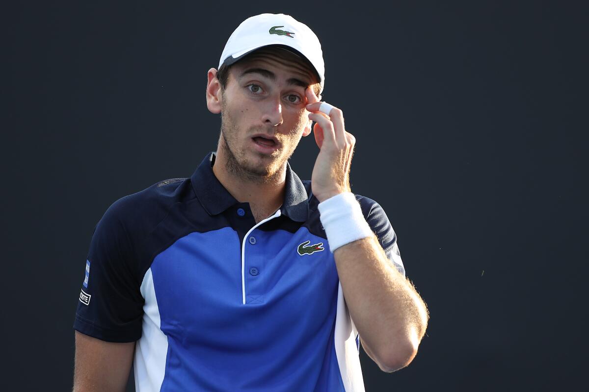 Elliot Benchetrit reacts during his match against Yuichi Sugita at the Australian Open.