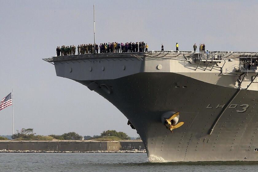 The amphibious assault ship USS Kearsarge leaves past Fort Monroe in Hampton, Virginia to head south for hurricane Harvey relief on Thursday.