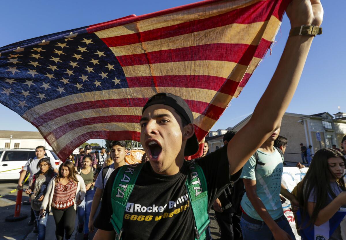 Students in South Gate protest the election of Donald Trump as president in front of City Hall.