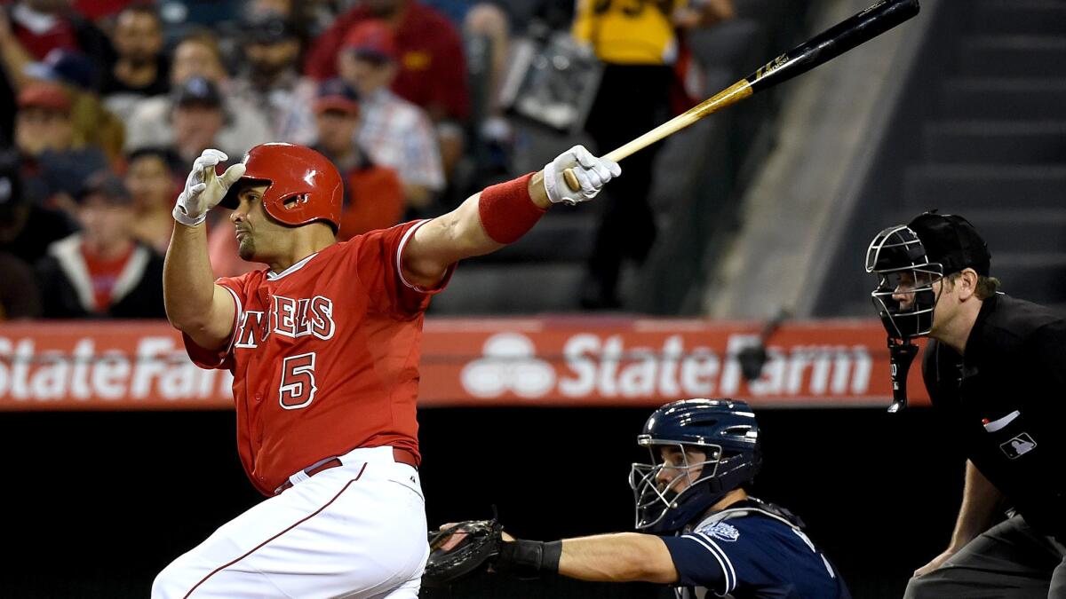 Angels slugger Albert Pujols connects for a single against the Padres during a game on May 27 in Anaheim.