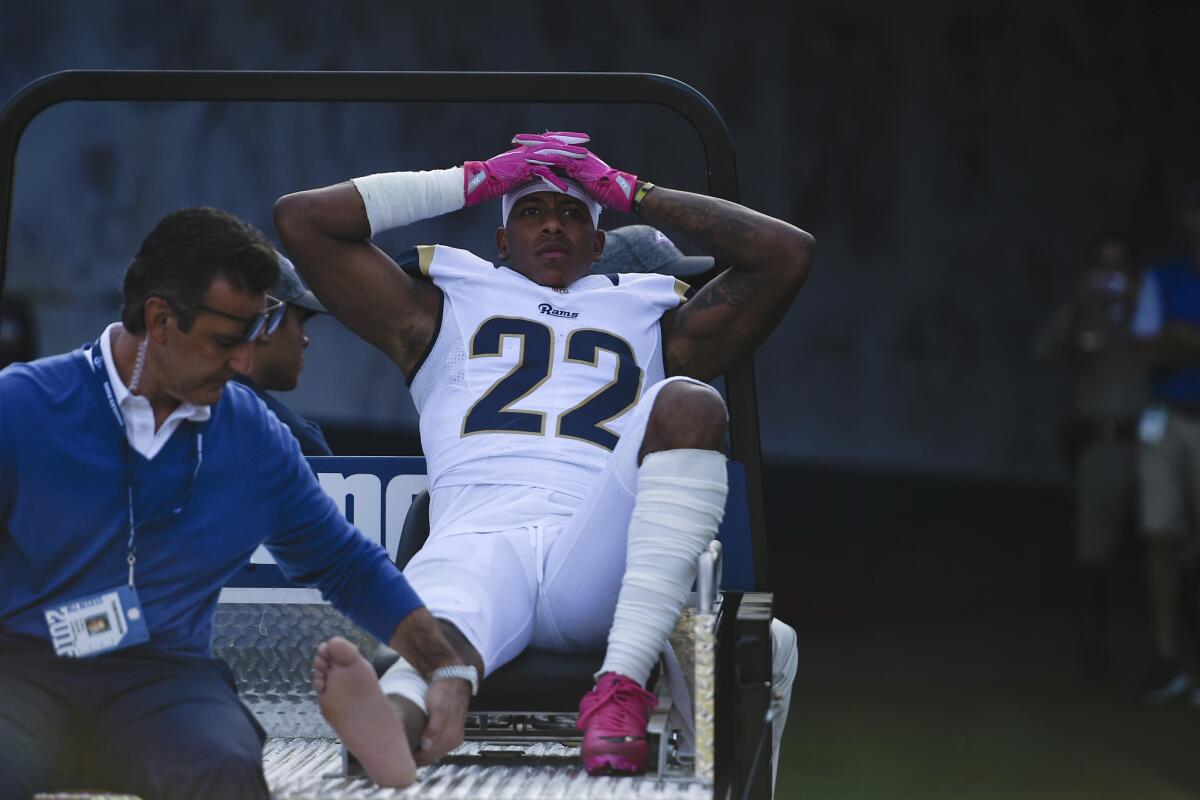 Rams cornerback Trumaine Johnson is carted off the field after suffering an ankle injury in the second half.