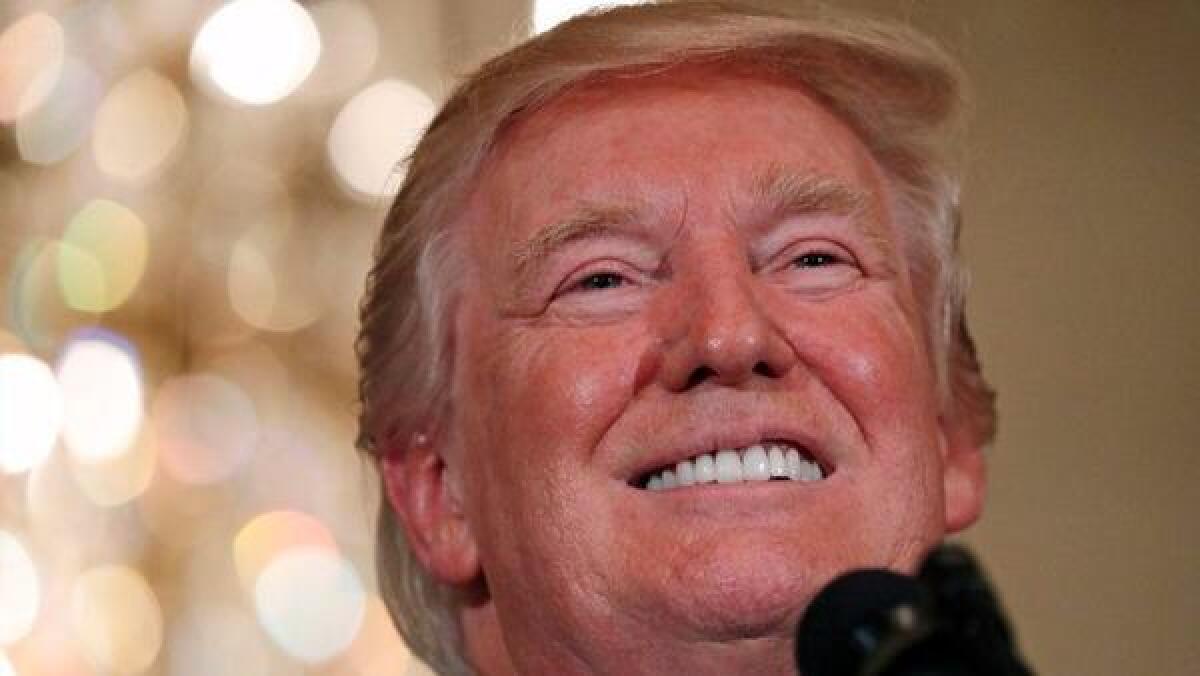 President Trump appears during a "Made in America" product showcase at the White House in July.